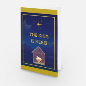 Christmas greeting card with graphic of baby Jesus in a manger in a dark blue night and the words "THE KING IS HERE" above it, and His star shining above that.
