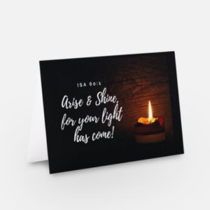 Front of greeting card with a picture of a dark background and a votive light on the right, and the text of Isa 60:1 on the left.